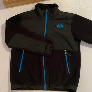 Unisex, black fleece north face jacket.